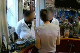 CCTV captures a couple allegedly leaving with cash after conning a pawnbroker with an audacious fake gold swap. 