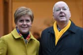 Former First Minister for Scotland and former leader of the Scottish National Party (SNP), Nicola Sturgeon, stands with her husband husband Peter Murrell.   (Photo by ANDY BUCHANAN / AFP) (Photo by ANDY BUCHANAN/AFP via Getty Images)