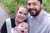 Iris-Rose Torr with her parents Karen and Shane