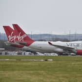Virgin Atlantic planes sit on the runway at Glasgow Airport.