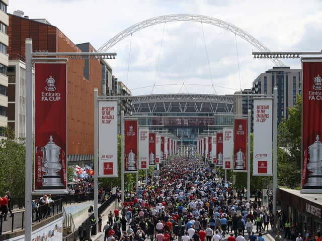 A fan was arrested at Wembley yesterday for wearing an offensive Hillsborough shirt