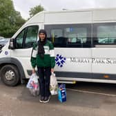 A Murray Park student delivering food parcels in Derby