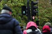 The green man at pedestrian crossings is set to light up for longer - as Brits walk slower than they did before.