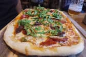 One of the meal deals on our list is this spicy sausage Diavola pizza at Harpur's of Melbourne where you can get two pizzas for £14.99 | Image Ria Ghei