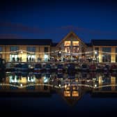 Twinkling lights adorn the Boardwalk Mercia Marina, which is a great destination both during the day and at night