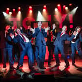 Cast appear on stage at Derby Theatre performing TONY! The Tony Blair Rock Opera