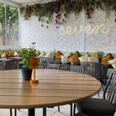 Muted greys and buff tones with a splash of mustard scatter cushions makes Seven Restaurant Derby an easy place to chill  | Credit Seven Restaurant and Cafe Bar Derby
