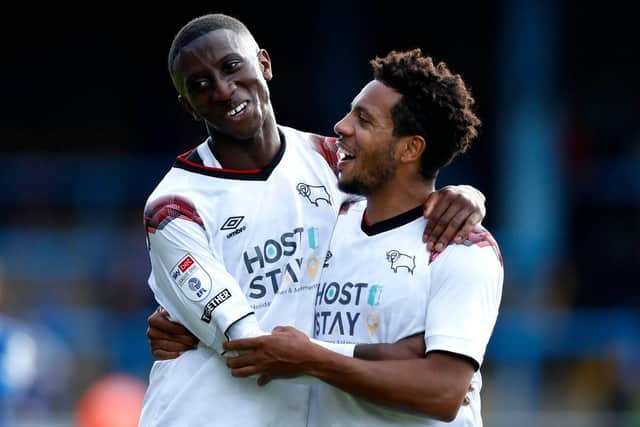 Tyrese Fornah celebrates with Korey Smith during a League One match vs Blackpool
