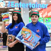 Kids can be part of Team Santa - pictured here are elves Alicia and Lexus - with this fabulous competition from The Entertainer | Image Simon Hadley