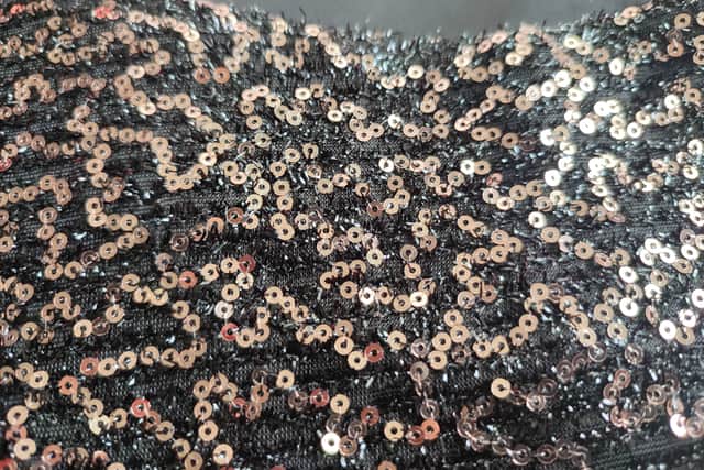 Rose gold and copper sequins on a black dress looked really pretty in the sun | Image Ria Ghei