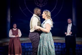 Jason Yeboa as Micah and Áine O’Neill-Mason as
Cinderella embrace on stage at Derby Theatre | Image Graeme Braidwood