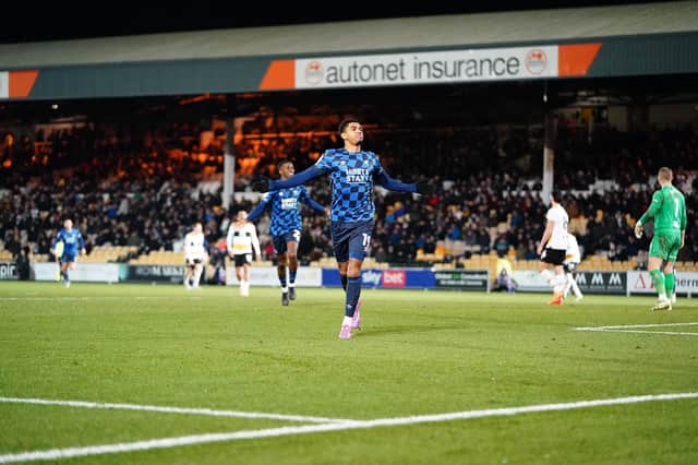 Tyreece John-Jules celebrates scoring a winning goal against Port Vale in a League One match