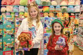 Harriet Tomlinson, aged 8, and Emilia Orridge, aged 5, from Derby, have been announced as Christmas toy testers for The Entertainer