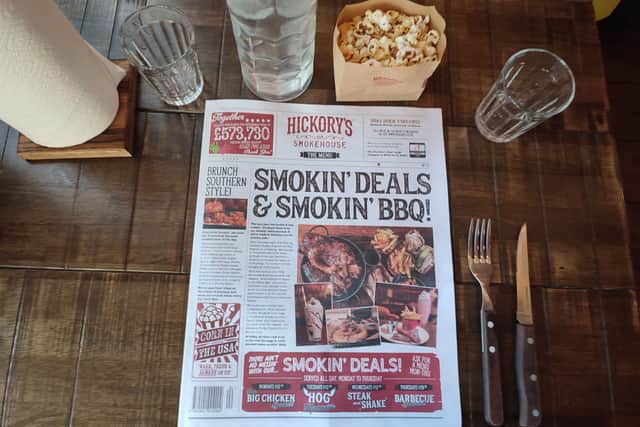 The menu as a newspaper, plus free popcorn and cold pitcher of water - which we didn't have to ask for - was a nice touch | Image Ria Ghei