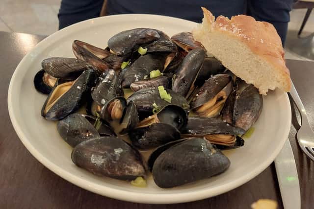 A bowl full of mussels along with a hunk of bread is part of Carluccio's set menu | Image Ria Ghei