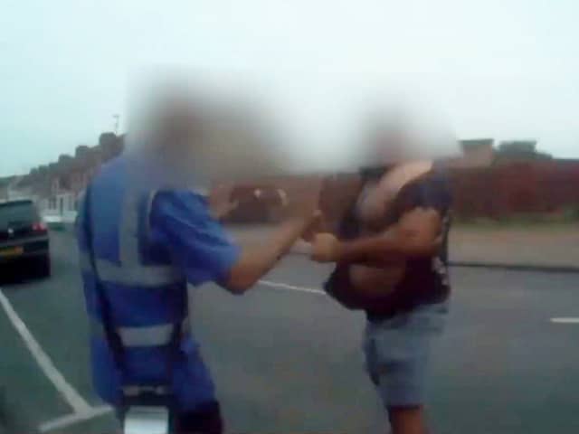 Shocking footage from a bodycam captured the moment a raging van driver threw a traffic warden to the ground after he ticketed his illegally parked van. Picture: Coventry City Council / SWNS