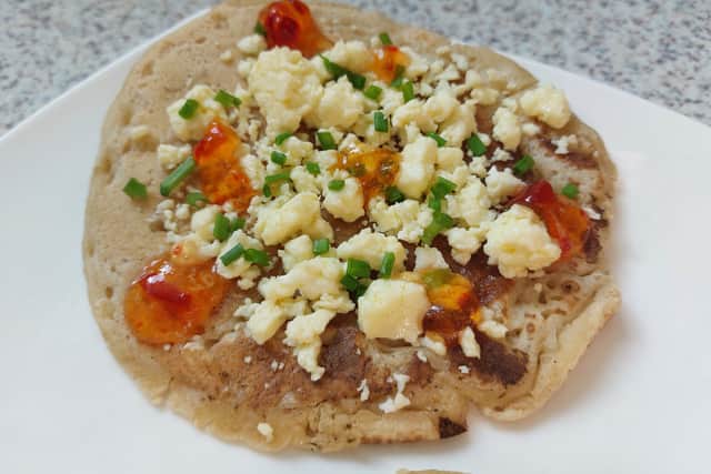 Derby pyclet with Lancashire cheese chunks and bright orange chilli jam was a pretty snack | Image Ria Ghei