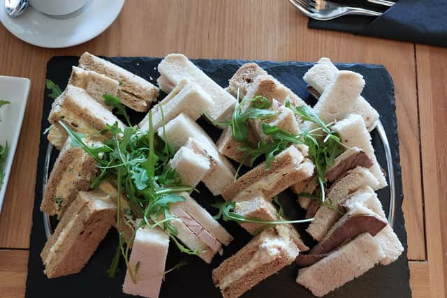 Sandwiches were served on a platter as part of afternoon tea | Image Ria Ghei