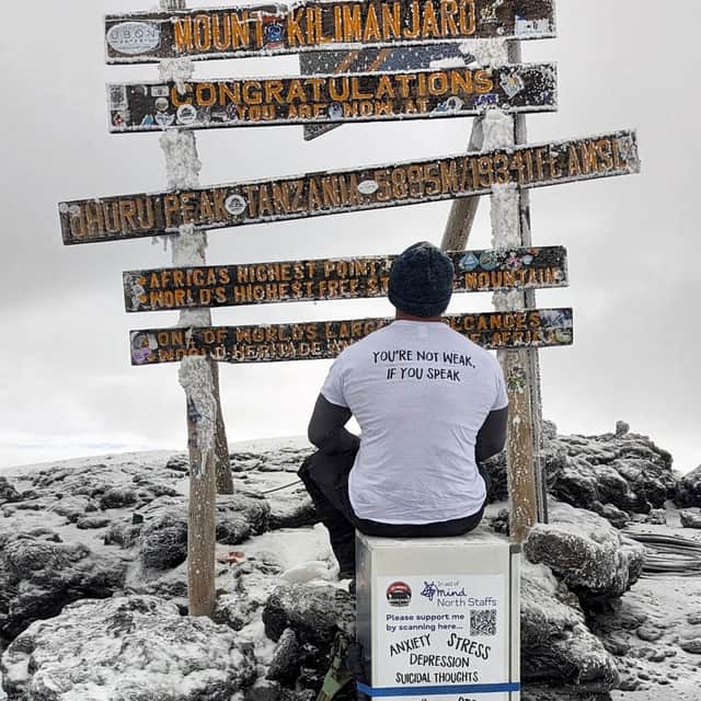 Michael Copeland from Stafford, on his climb up Kilimanjaro with a fridge on his back. A former soldier has conquered Africa's highest mountain whilst carrying a fridge on his back.