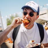 Derby Wing Fest is expected to welcome thousands to the city - much like this chicken wing fan - for the spring food festival with a twist 