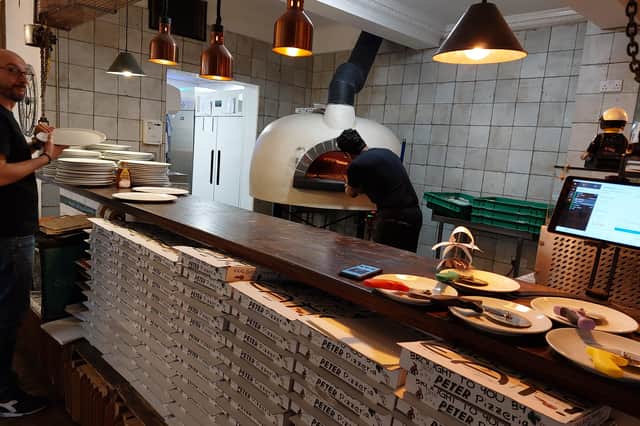 Pizzas are blasted in the on-site oven for 90 seconds | Image Ria Ghei