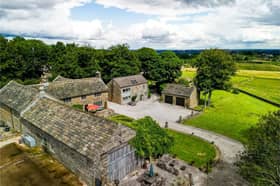 The glorious farmhouse is on the market for £1.95m in Derbyshire 