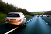 Miley Connors, 37, driving dangerously on the hard shoulder of the M40.  