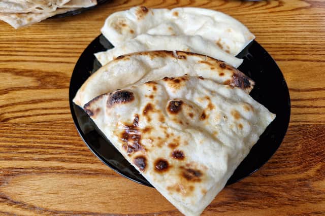 Warm naan was so good, I could have eaten the soft triangles on their own Photo Ria Ghei