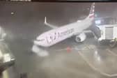 Plane blown away from airport gate by ferocious 80mph winds.