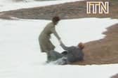 Neil Kinnock falls over on Brighton seafront in 1983.