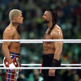Roman Reigns and Cody Rhodes look on during Night Two at Lincoln Financial Field on April 07, 2024 in Philadelphia, Pennsylvania.  (Photo by Tim Nwachukwu/Getty Images)
