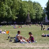 People enjoying warm weather during a heatwave in London. (Photo: Hollie Adams/Getty Images)