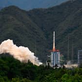A rocket successfully lifts off from a space base in Xichang, in China's southwestern Sichuan province on June 22, 2024. (Photo by ADEK BERRY/AFP via Getty Images)