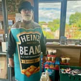 Neil Potter is the Derbyshire man on a mission to collect food donations for a local food bank. His persona as 'Heinz Hero' sees him dress up as a can of baked beans, drawing people's attention and raising awareness of South Derbyshire CVS food bank appeal.
