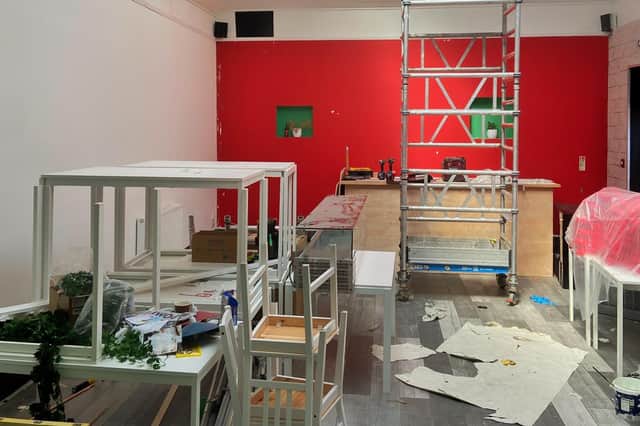 Walls are being painted and new flooring is being installed as part of the restaurant's refurbishment