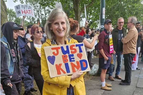A Derby protest saw hundreds of people turn out onto the streets of Derby. One attendee held aloft a 'Just Be Kind' placard at the congregration that saw no disturbances reported.