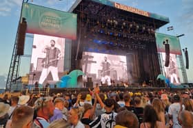 Courteeners on stage, with a classic Juventus shirt in view 