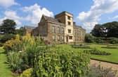 Canons Ashby is a striking Tudor manor overlooking pretty terraced gardens