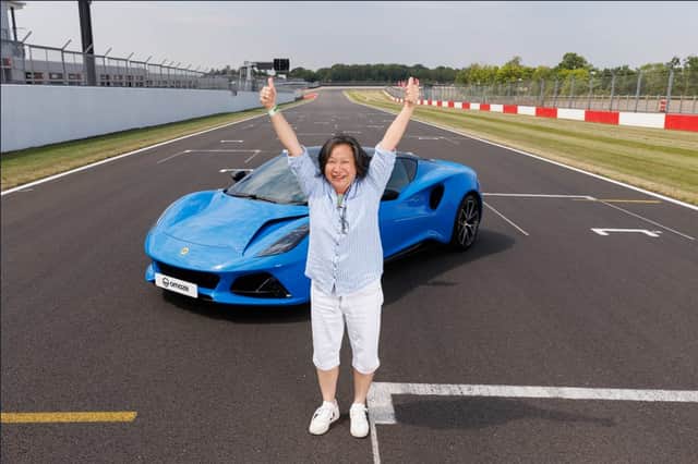 It’s a double thumbs from Elizabeth, who is thrilled with her new supercar