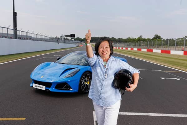 Elizabeth Hon gives a big thumbs up for her new 180mph Lotus Emira. Taking it for a spin at Donington race circuit left the adventurous car enthusiast 'exhilarated'