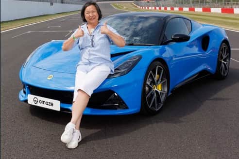 Elizabeth’s new car is her pride and joy. Her Lotus has a striking Black Alcantara trim with yellow stitching and Jet fighter-style flip-up cover for Start button.