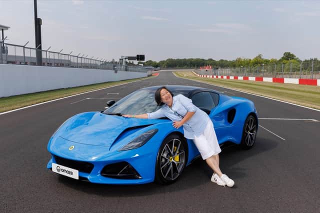 Elizabeth is thrilled with her new set of wheels. Its top features include a gloss black roof and cantrails, mirror pods, tailpipe finishers and rear badge.
