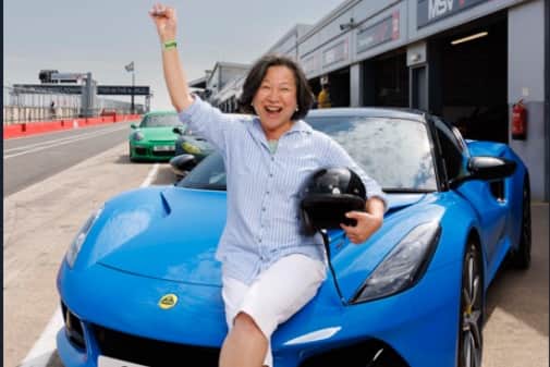 Elizabeth poses with her new car. It is a fully loaded First Edition model in a stunning Seneca Blue with 20in ‘diamond cut’ lightweight wheels and Yellow brake callipers.