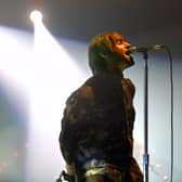 Oasis rock group performs during a concert, late 20 November 2002 in Spain. Photo: RAFA RIVAS/AFP via Getty Images