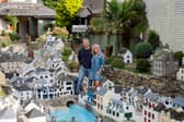 Lee and Julie Gregory with the model of Polperro in Cornwall which is now up for sale.