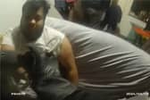 Police wake sleeping drug dealer to arrest him.
