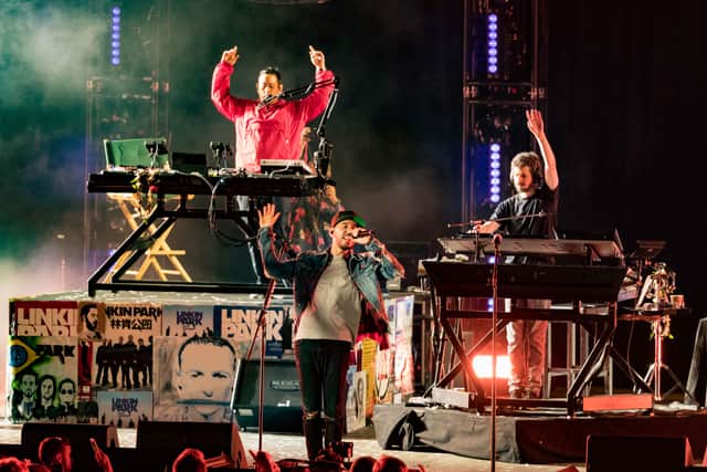 HOLLYWOOD, CA - OCTOBER 27:  Musicians from Linkin Park;  Brad Delsen, Mike Shinoda and Joe Hahn perform during the "Linkin Park And Friends Celebrate Life In Honor Of Chester Bennington" concert at the Hollywood Bowl on October 27, 2017 in Hollywood, California.