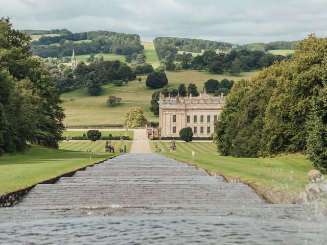 Travel experts have named Chatsworth House as one of the most iconic landmarks in Derbyshire. It garnered over 3.1 million Wikipedia searches. Pictured is a view of Chatsworth House from the Cascade