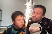 Non-verbal autistic boy communicates using dad's alphabet tattoo