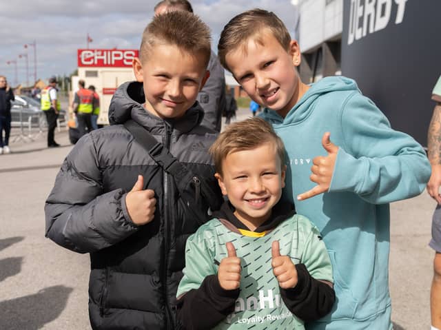 The Rams took on Cardiff City on Saturday, September 14, 2024. Photos show crowds who loved the thrilling match, including these three smiling faces who showed bucket loads of enthusiasm, enough to fill the entire stadium!